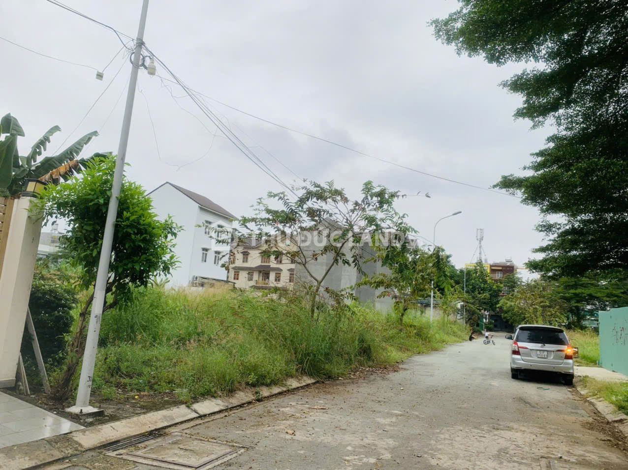 Bán đất mặt tiền KDC Hoàng Anh Minh Tuấn, Phước Long B, DT 250m2 ngang 10m, đường 12m, sổ hồng riêng
